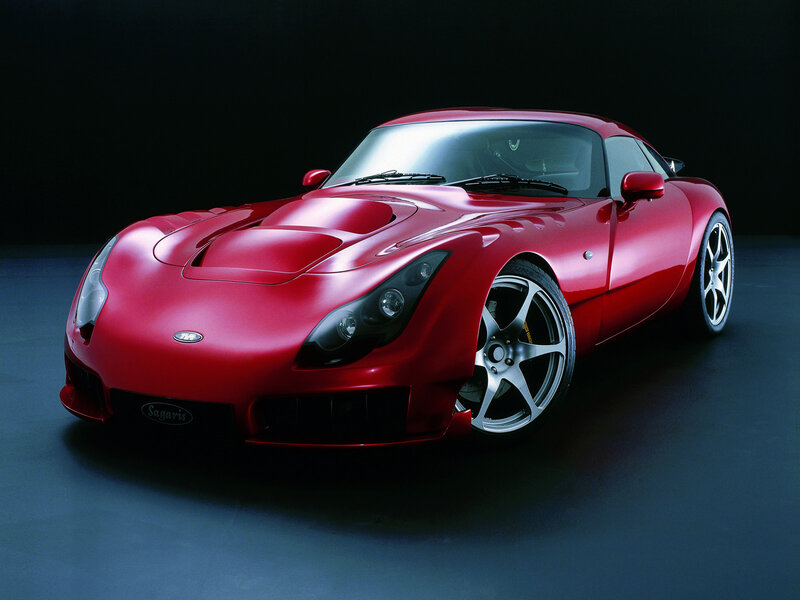 Red sports car on dark background