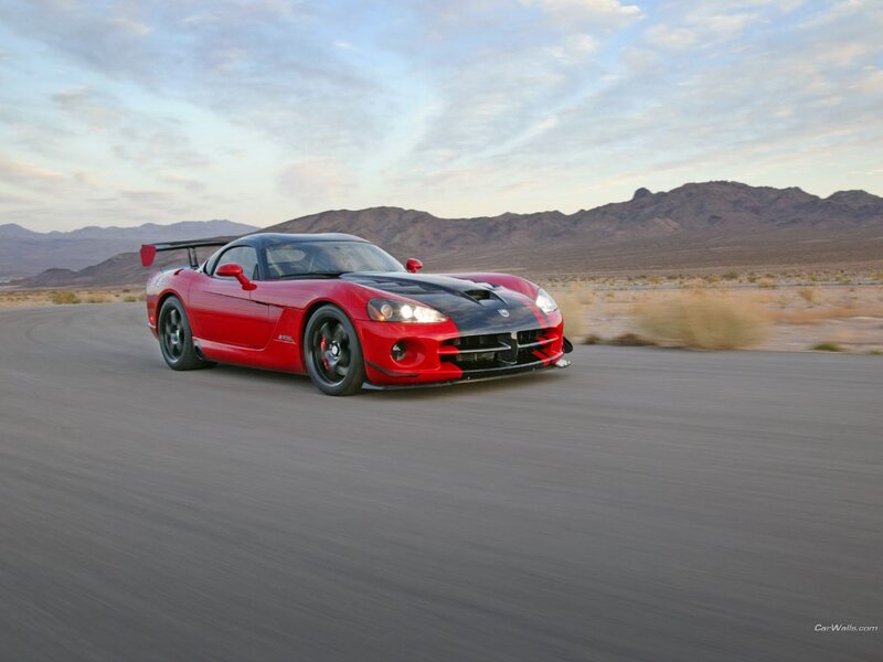 red sports car on desert road