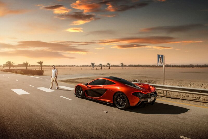 Red sports car on desert road