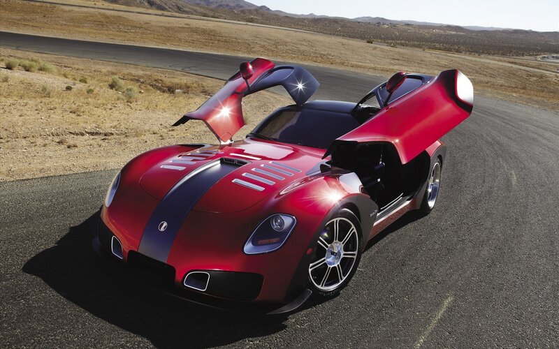 Red sports car on desert track