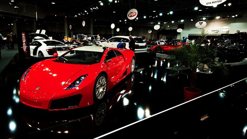 Red Sports Car on Display — Dramatic, Night, Photograph
