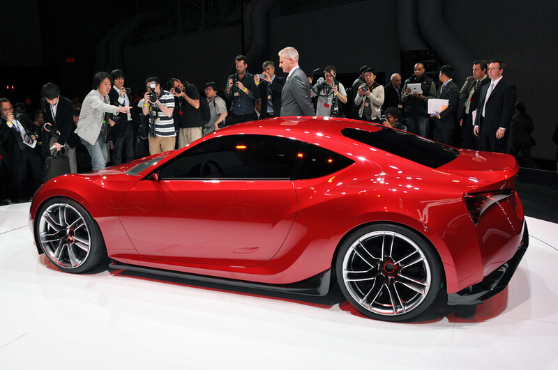 Red Sports Car on Display — Dramatic