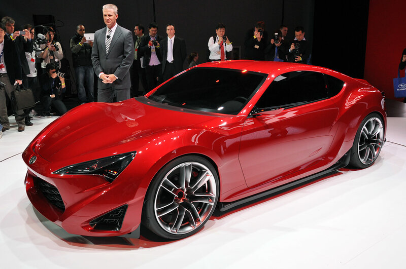 Red Sports Car on Display — Formal