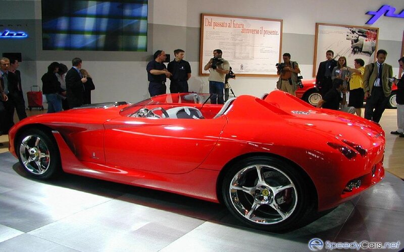 Red Sports Car on Display — Neutral, Photograph, People, Camera