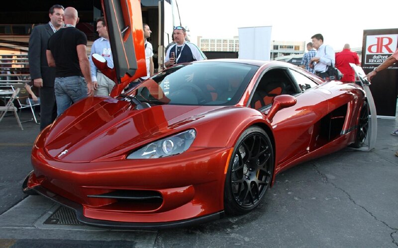 Red Sports Car on Display — Public Event