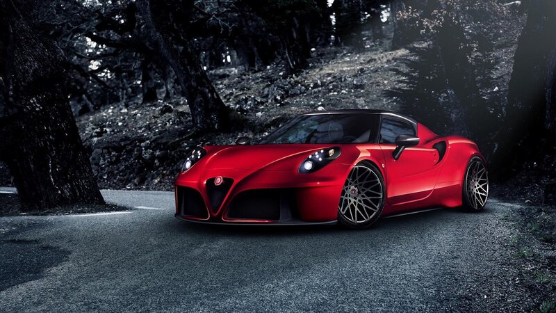 Red sports car on forest road