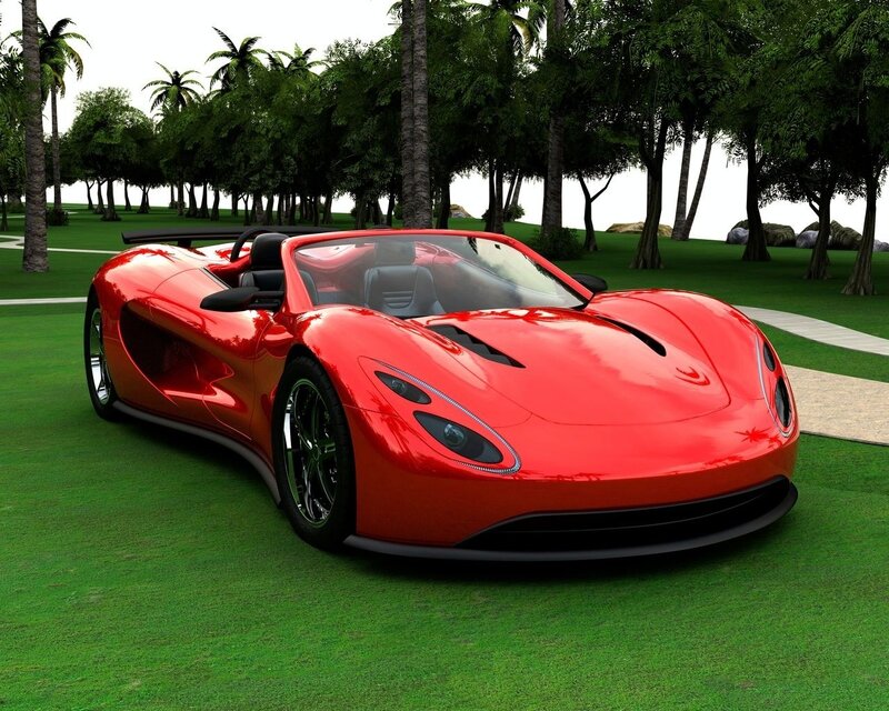 Red sports car on grass