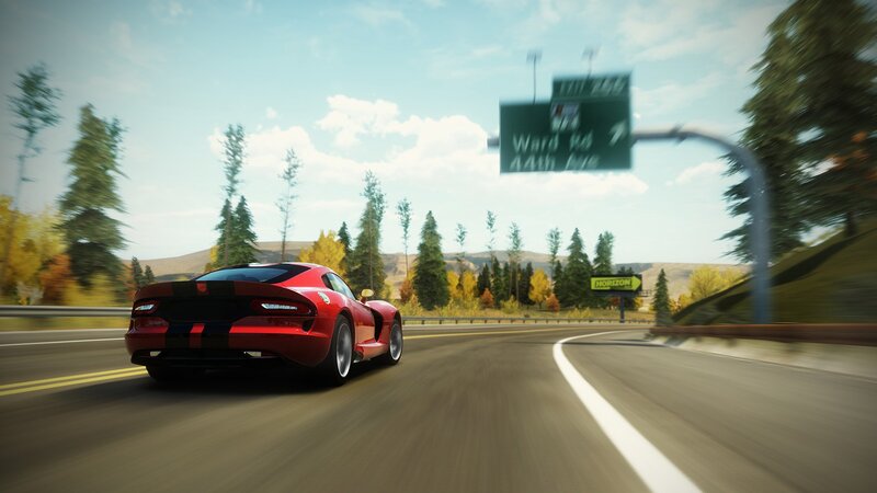 red sports car on highway