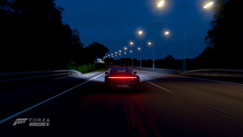 Red Sports Car on Highway — Black
