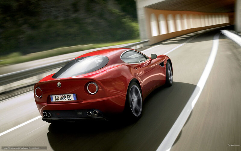 red sports car on highway