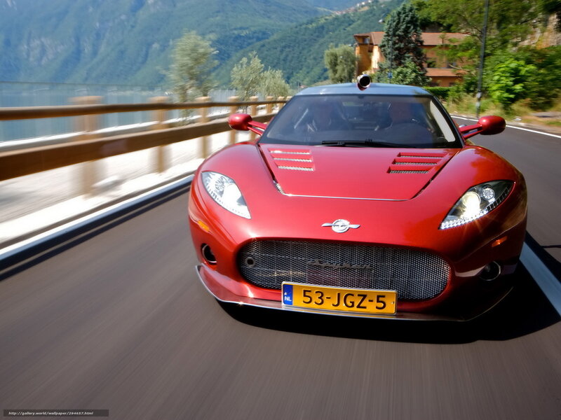red sports car on mountain road