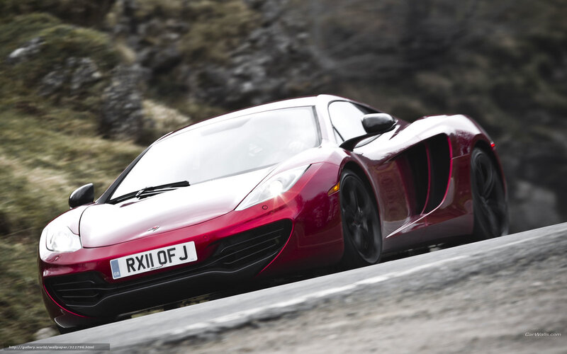 red sports car on mountain road
