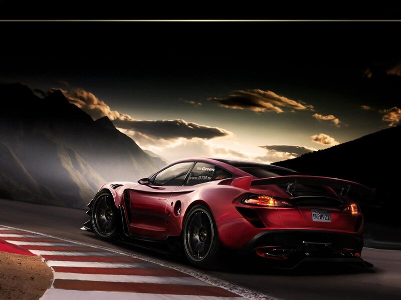 Red sports car on mountain road