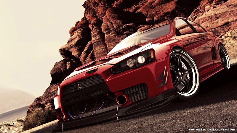 red sports car on mountain road