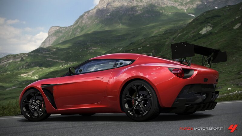Red sports car on mountain road