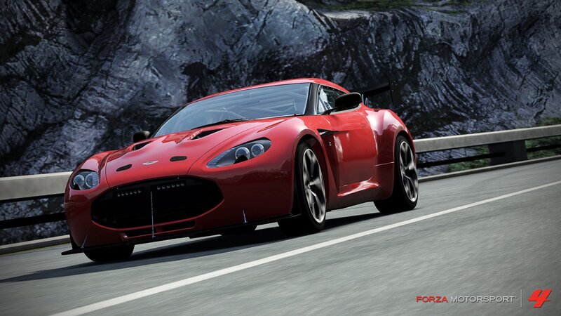 red sports car on mountain road