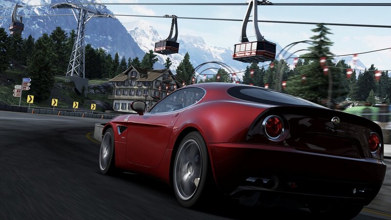 red sports car on mountain road
