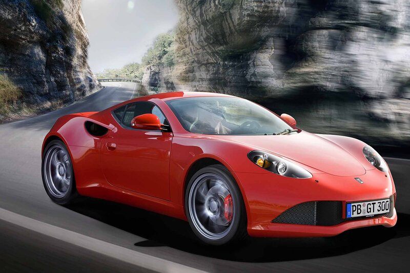 Red sports car on mountain road