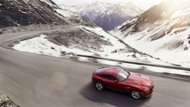 Red Sports Car on Mountain Road — Dramatic, Winter