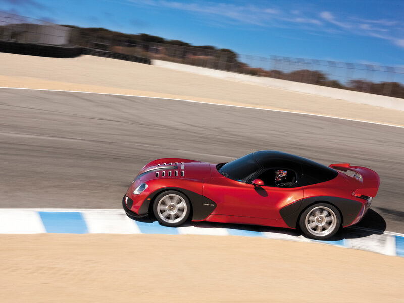 Red sports car on racetrack
