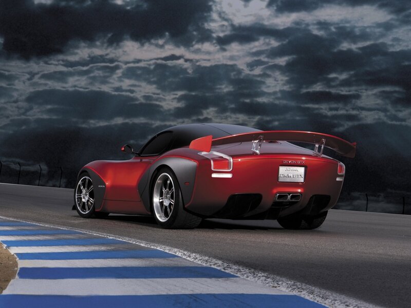 Red sports car on racetrack