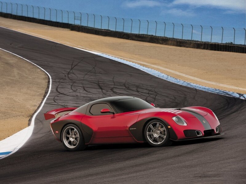 Red sports car on racetrack