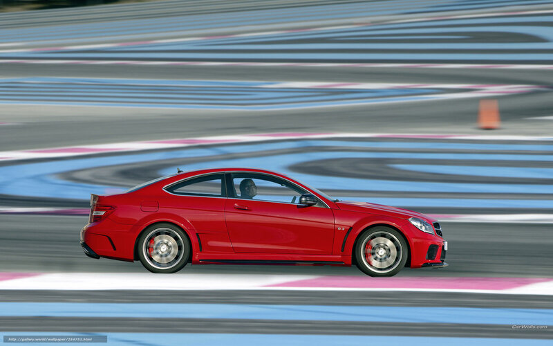 red sports car on racetrack