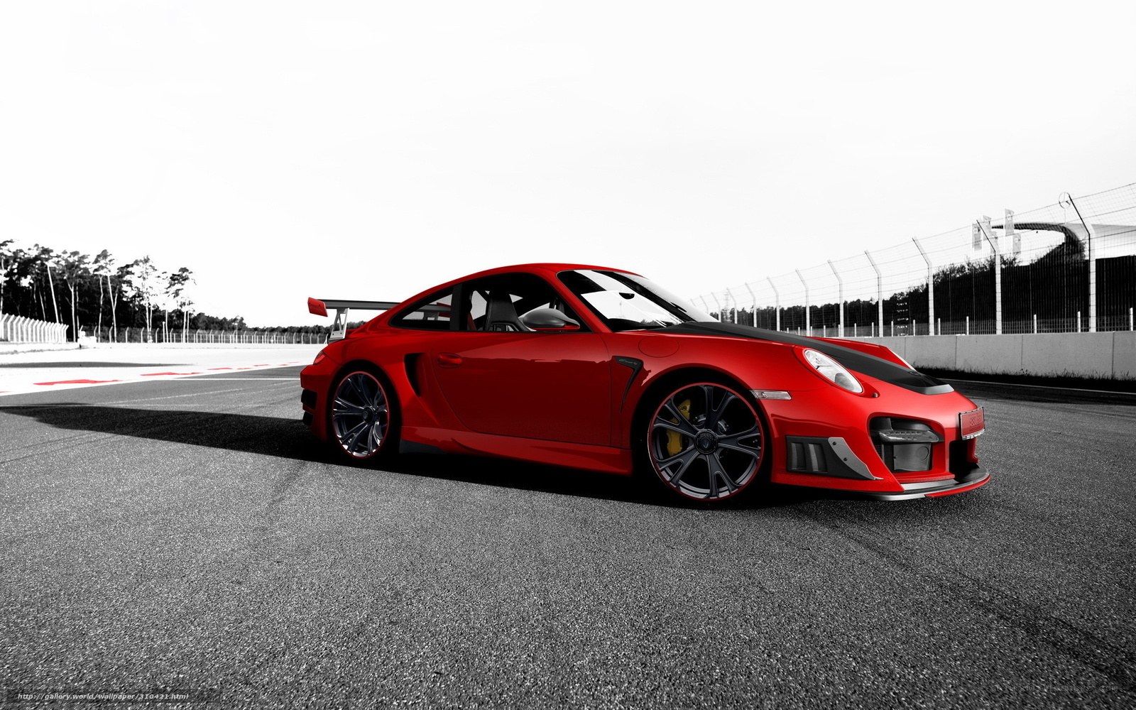 Red sports car on racetrack
