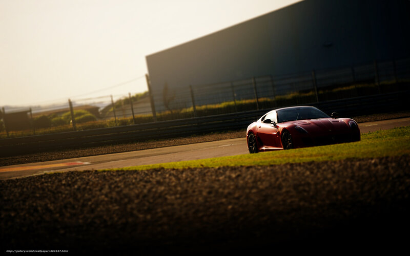 Red sports car on racetrack