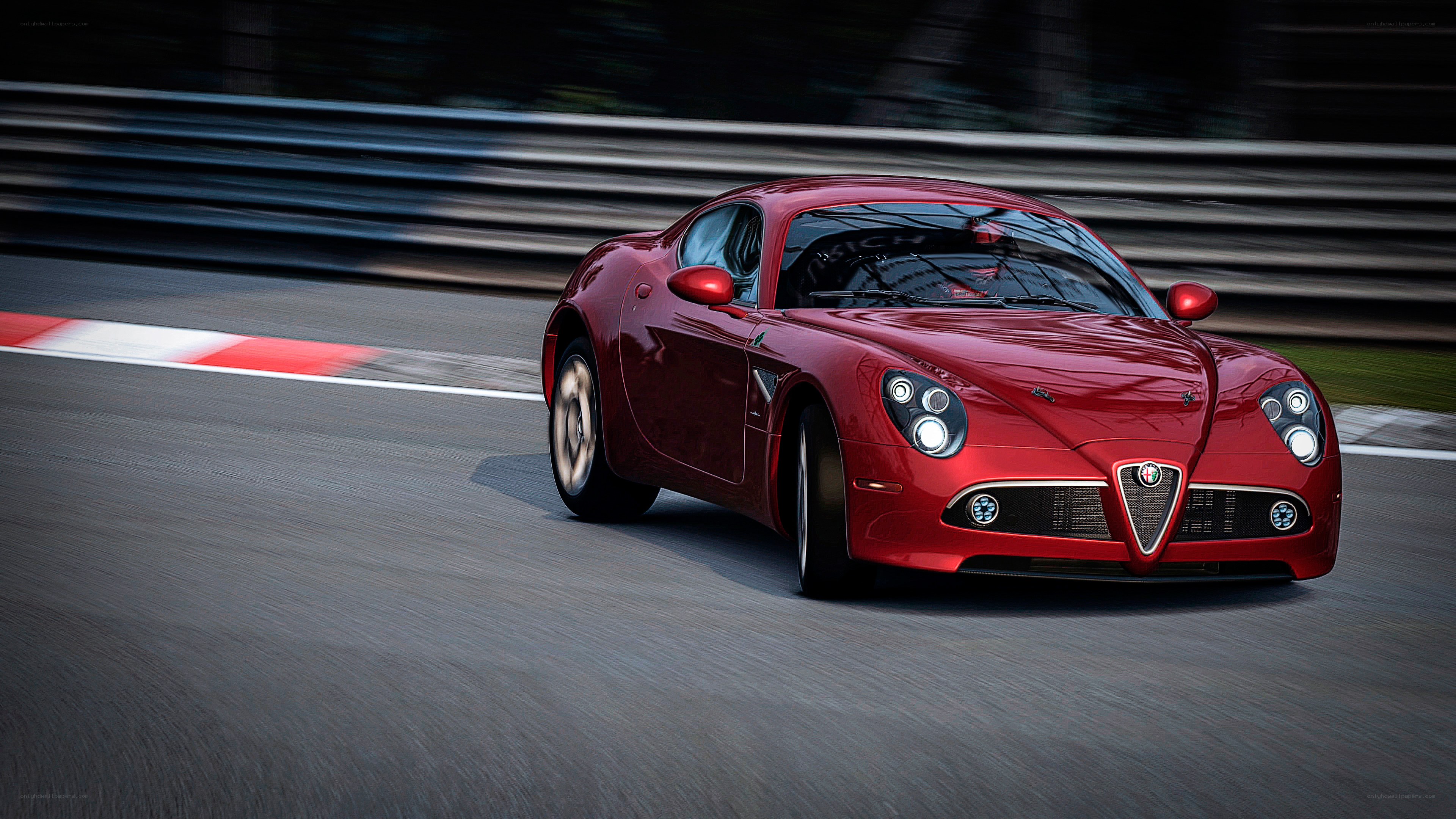 Red sports car on racetrack