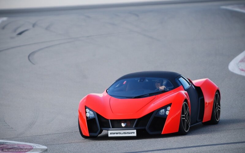 Red sports car on racetrack