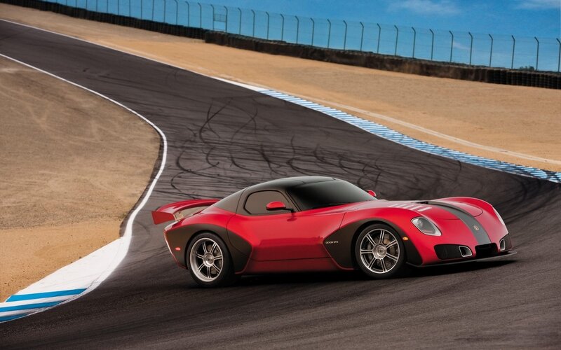 Red sports car on racetrack
