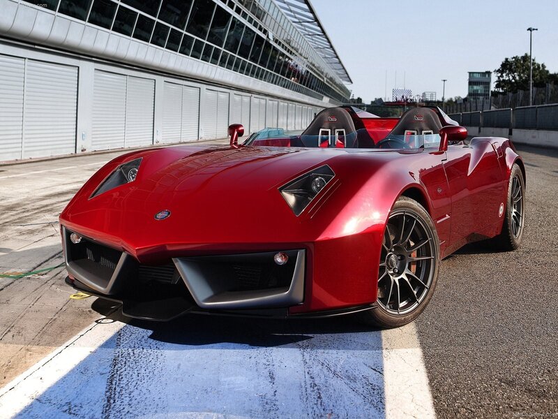 red sports car on racetrack