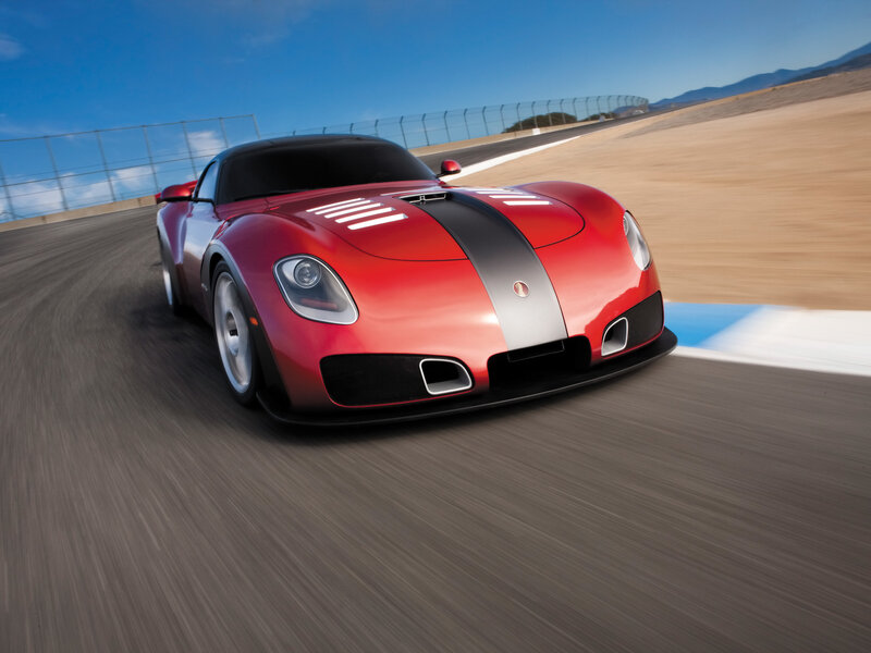 Red sports car on racetrack