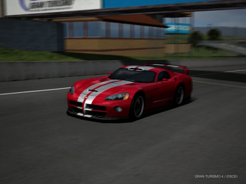 red sports car on racetrack