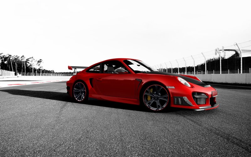 Red sports car on racetrack