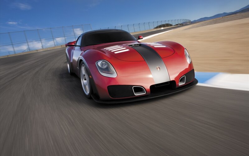 Red sports car on racetrack
