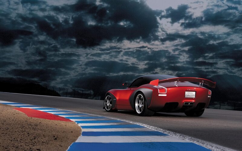 Red sports car on racetrack