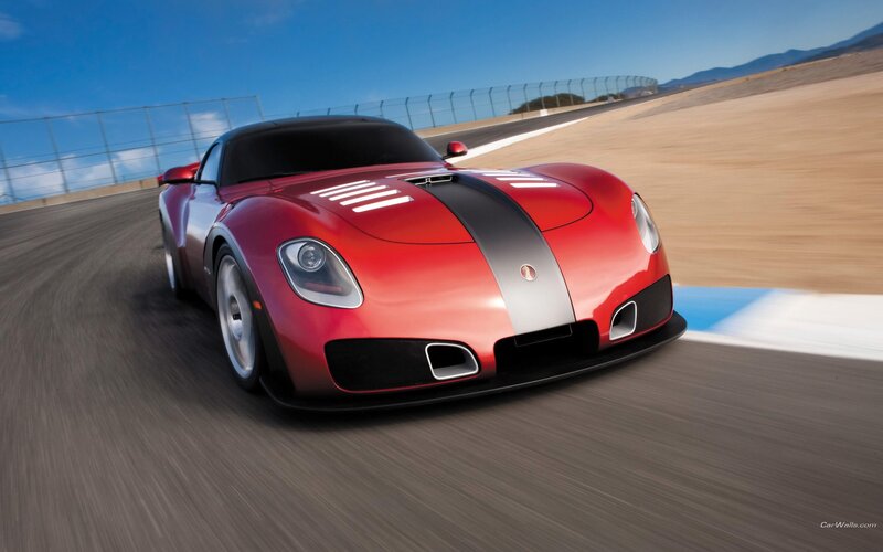 red sports car on racetrack