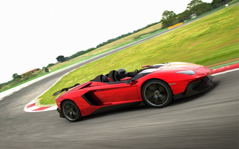 Red sports car on racetrack