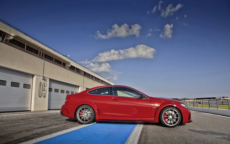 Red sports car on racetrack