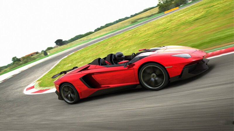 red sports car on racetrack