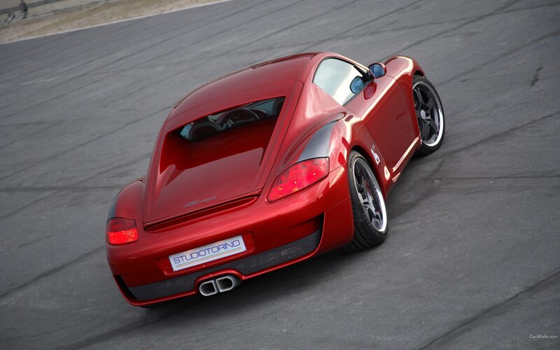 red sports car on racetrack
