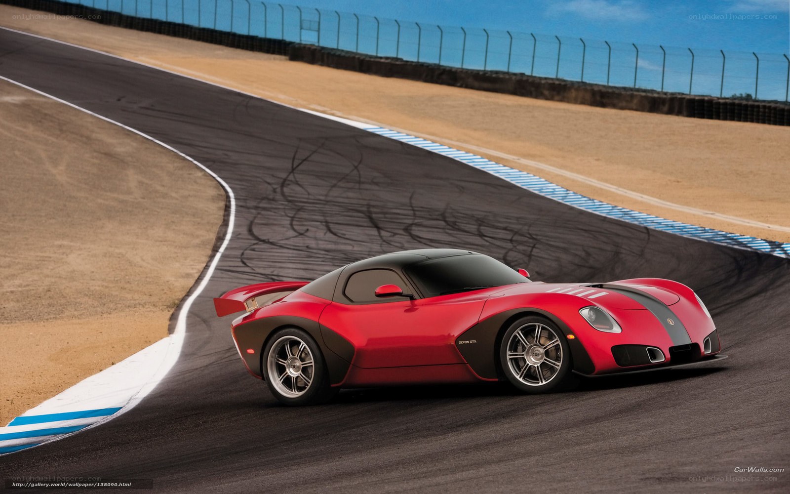 Red sports car on racetrack
