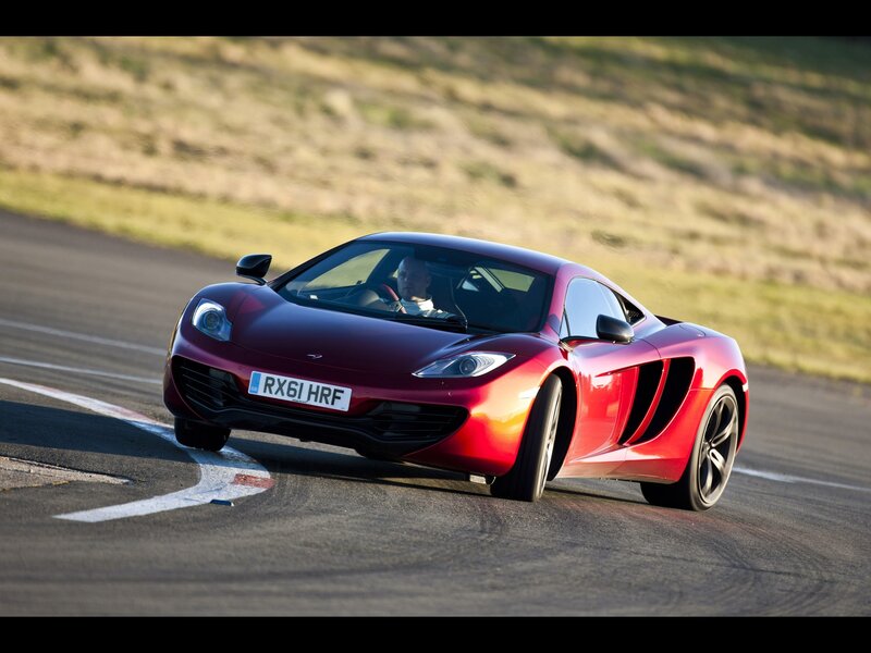red sports car on racetrack