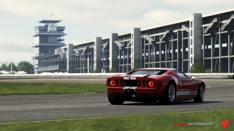 red sports car on racetrack