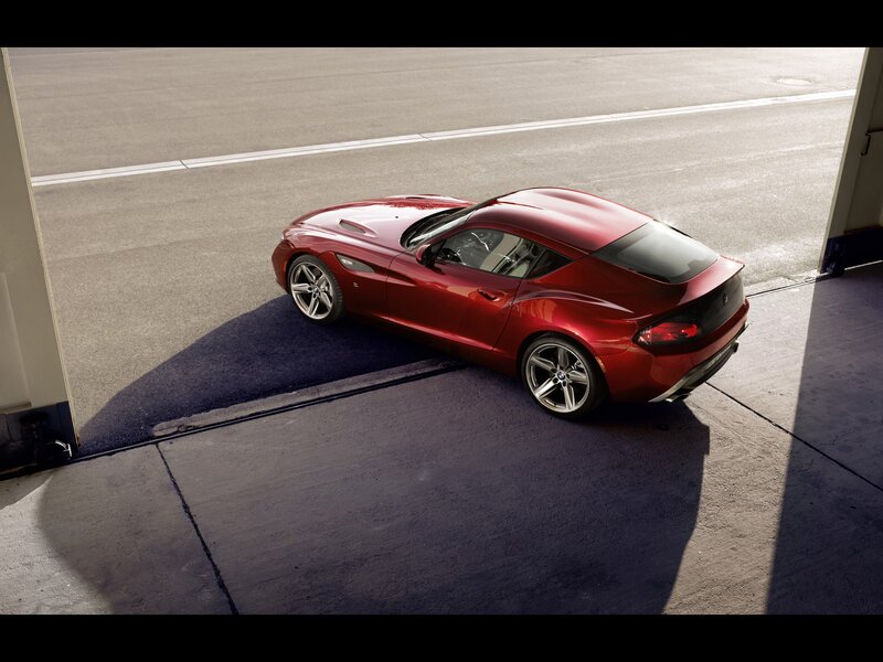 Red sports car on racetrack