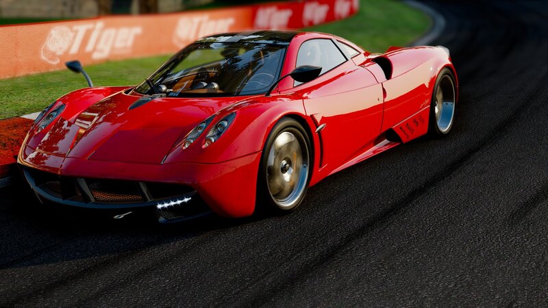 red sports car on racetrack