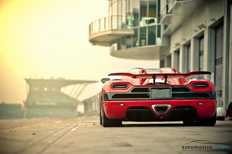 Red sports car on racetrack