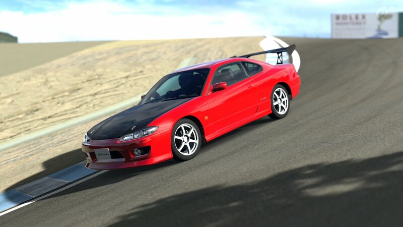 Red sports car on racetrack